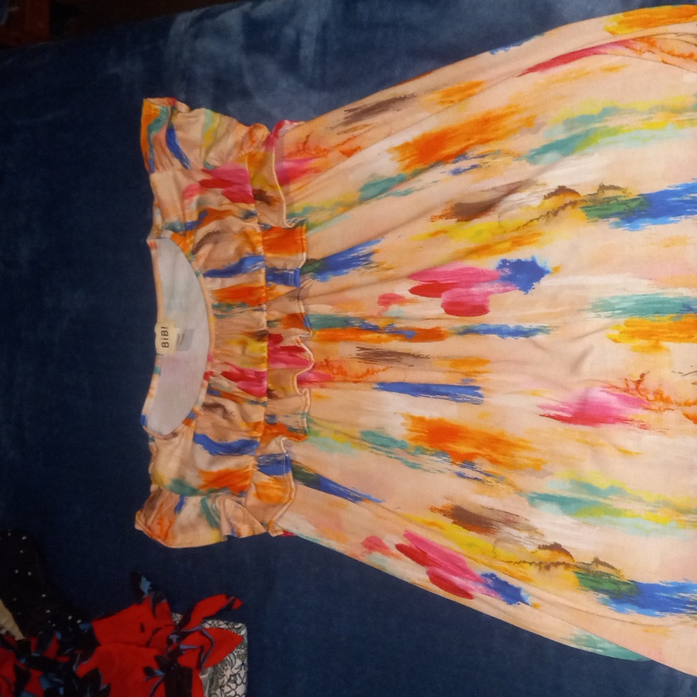 BiBi size small shirt, multi colored.
